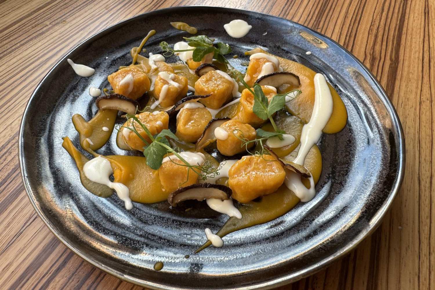 gnocchi di zucca con funghi porcini e pecorino